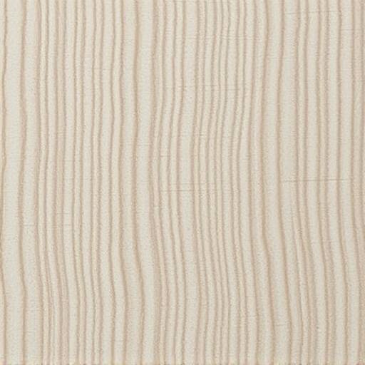 A close-up photo of Aiko Nakamura, Materials Specialist, examining a sample of pale oak wood.